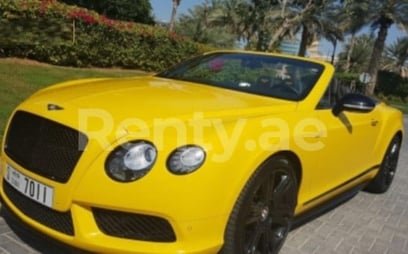 Yellow Bentley Continental GTC for rent in Dubai