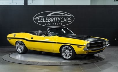 Yellow Dodge Challenger for rent in Dubai 1