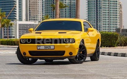 Yellow Dodge Challenger for rent in Dubai