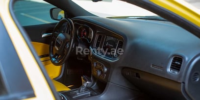 Yellow Dodge Charger for rent in Dubai 1