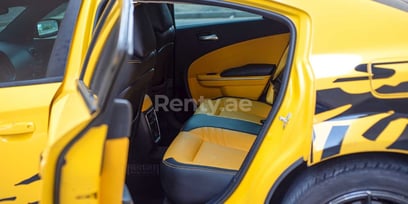 Yellow Dodge Charger for rent in Dubai 2