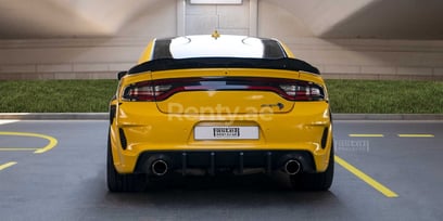 Yellow Dodge Charger for rent in Dubai 4
