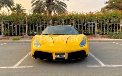 Yellow Ferrari 488 Spyder for rent in Dubai