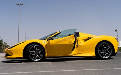 Yellow Ferrari F8 Tributo Spyder for rent in Sharjah