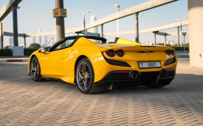 Yellow Ferrari F8 Tributo Spyder for rent in Dubai 2