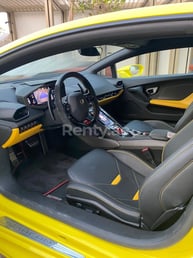 Yellow Lamborghini Evo for rent in Dubai 5