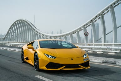 Yellow Lamborghini Huracan Coupe for rent in Sharjah 1