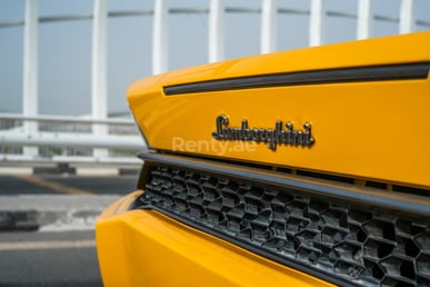 Yellow Lamborghini Huracan Coupe for rent in Dubai 3