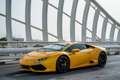 Yellow Lamborghini Huracan Coupe for rent in Dubai 4