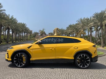 Yellow Lamborghini Urus for rent in Dubai 2