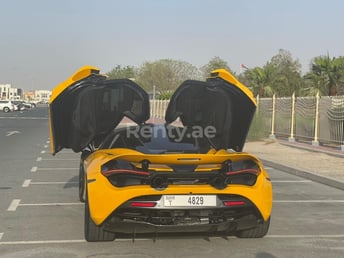 Yellow McLaren 720 S for rent in Dubai 2