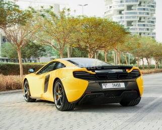 Yellow McLaren 650S Spider for rent in Dubai 0