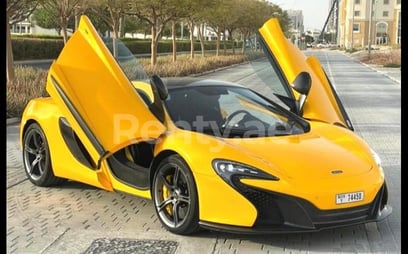 Giallo McLaren 650S Spider in affitto a Abu-Dhabi