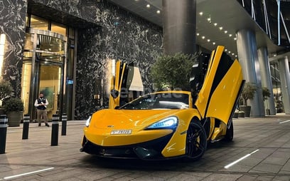 Yellow McLaren 570S for rent in Dubai