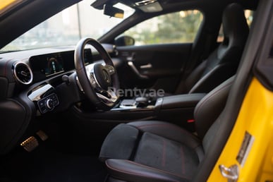 Yellow Mercedes CLA 250 for rent in Sharjah 3