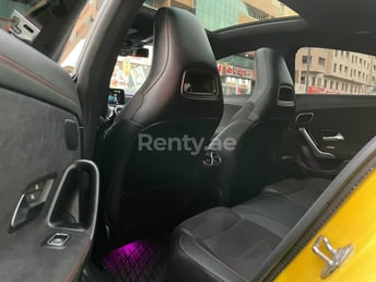 Giallo Mercedes CLA 35AMG in affitto a Sharjah 0