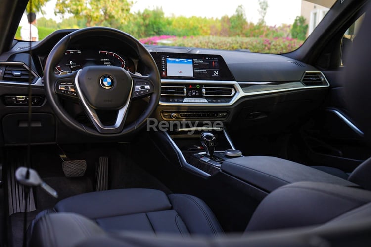 Black 2021 BMW 330i with M3 competition bodykit and upgraded exhaust system for rent in Sharjah 2