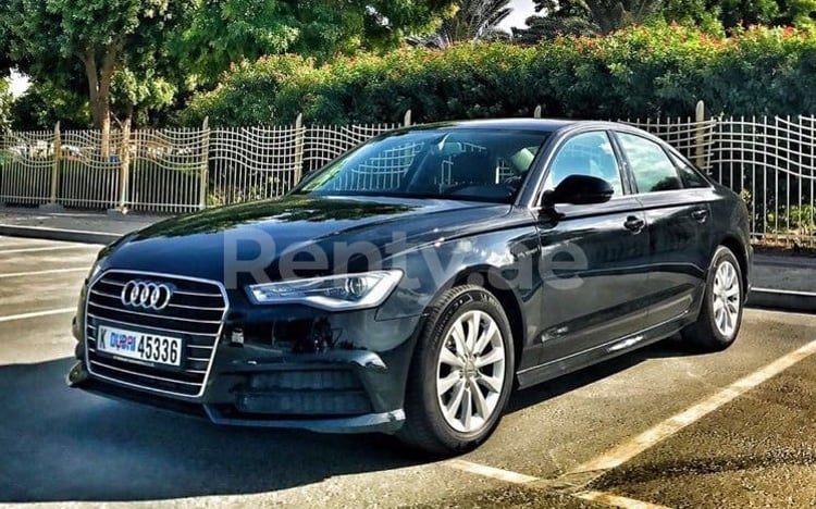 Black Audi A6 for rent in Abu-Dhabi