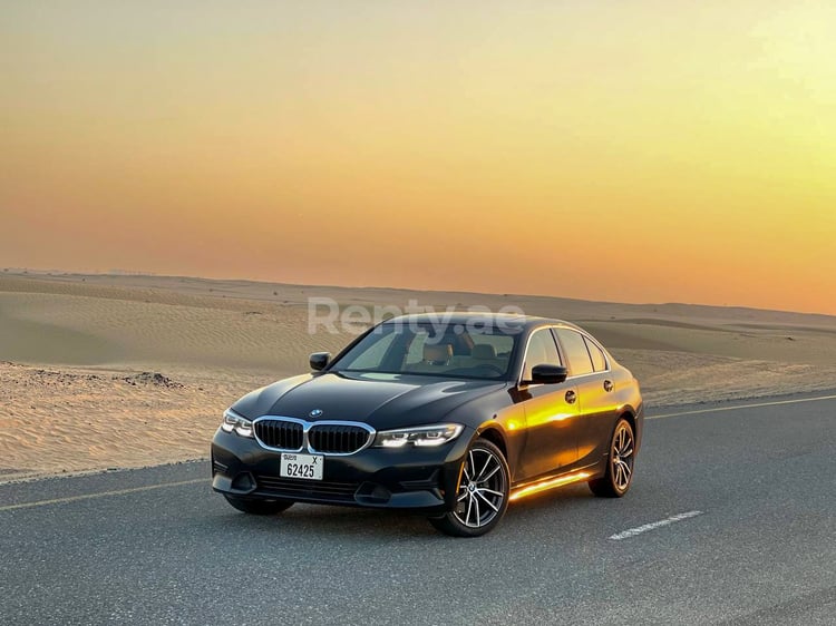 Black BMW 3 Series for rent in Dubai 2