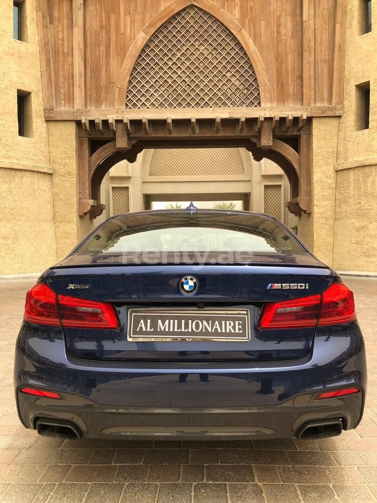 Black BMW 5 Series M550 for rent in Sharjah 0