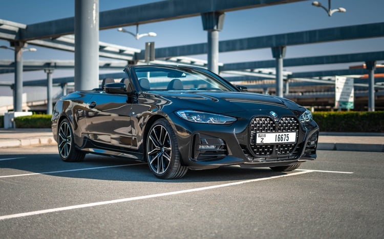 Black BMW 430i cabrio for rent in Sharjah