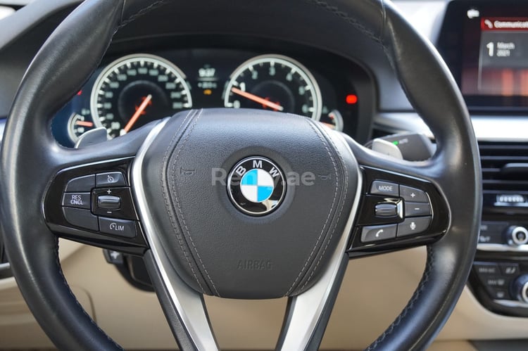 Black BMW 520I for rent in Dubai 3