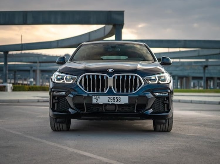 Dark Blue BMW X6 M-kit for rent in Dubai 0