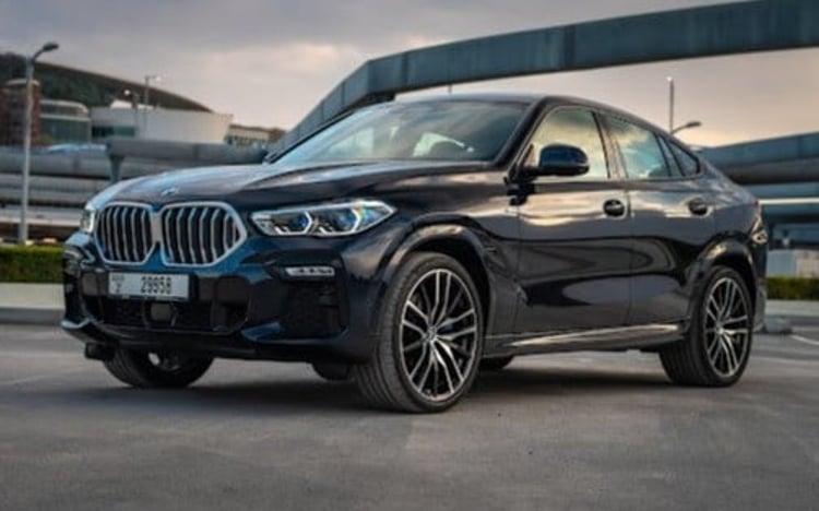 Dark Blue BMW X6 M-kit for rent in Dubai