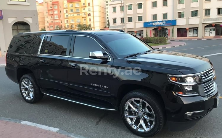 أسود Chevrolet Suburban للإيجار في أبو ظبي