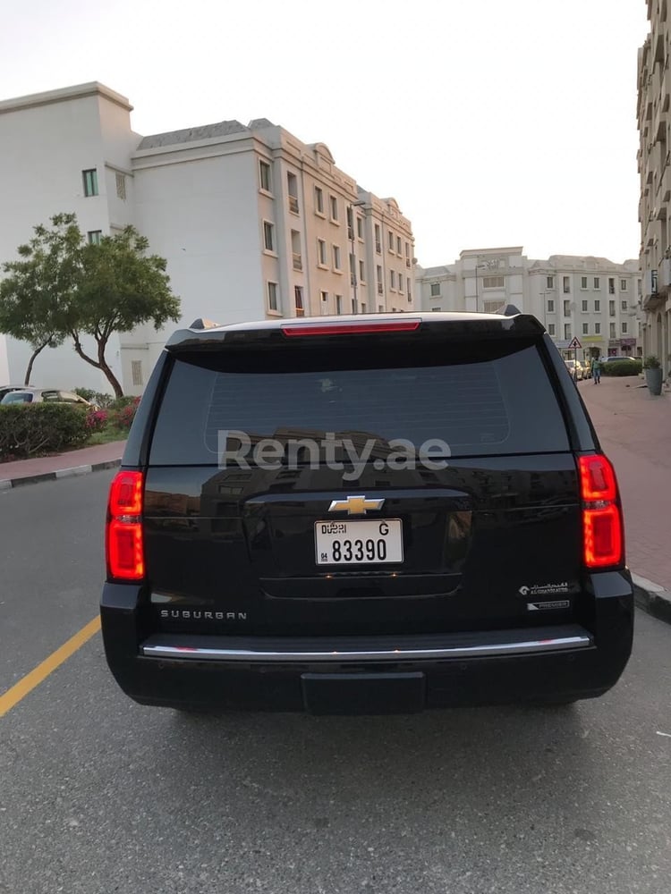 Black Chevrolet Suburban for rent in Abu-Dhabi 1