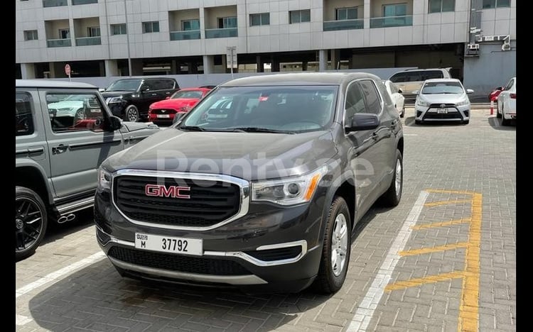 Black GMC Acadia for rent in Abu-Dhabi