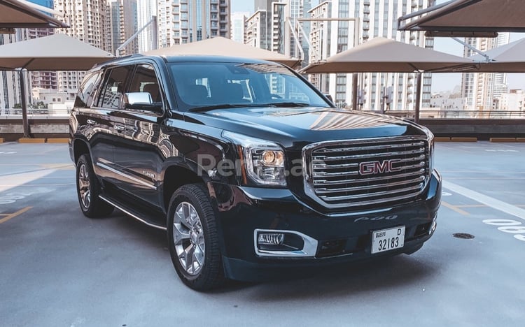 Black GMC Yukon for rent in Dubai