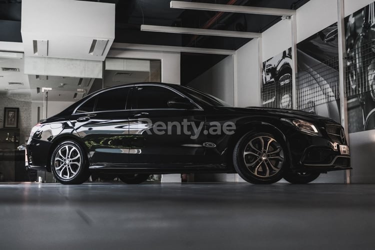 Black Mercedes C Class for rent in Dubai 0