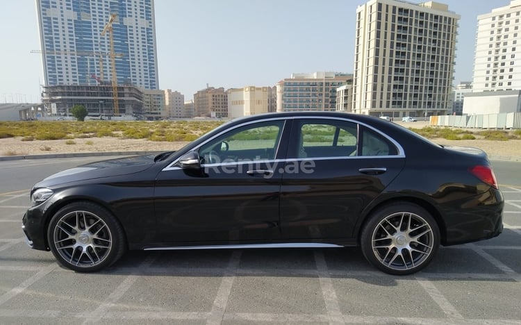 Black Mercedes C300 Class for rent in Abu-Dhabi