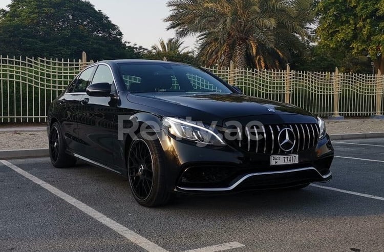 Black Mercedes C63 AMG specs for rent in Abu-Dhabi