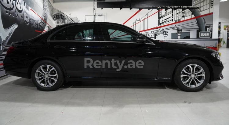 Black Mercedes E 200 for rent in Dubai 0