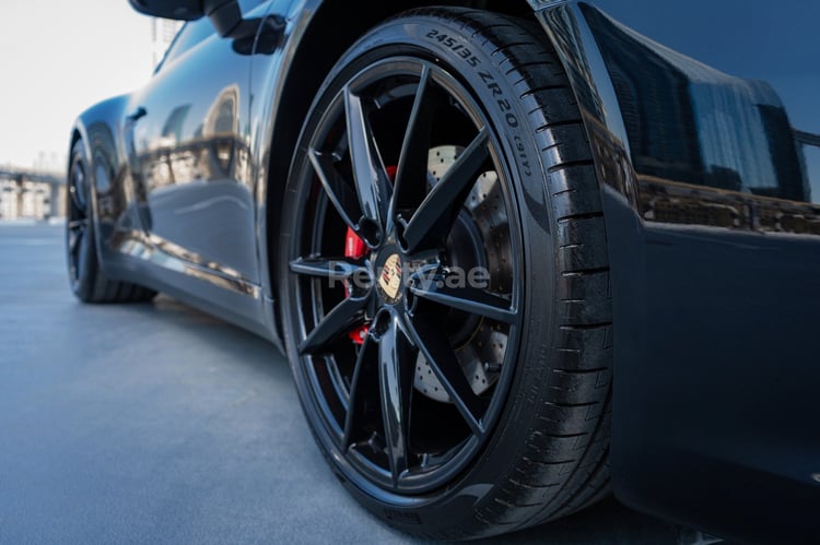 Black Porsche 911 Carrera S for rent in Dubai 1