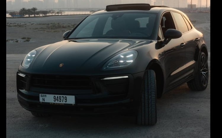 Black Porsche Macan Platinum for rent in Sharjah