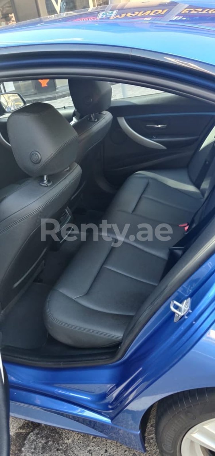 Blue BMW 318 for rent in Abu-Dhabi 1