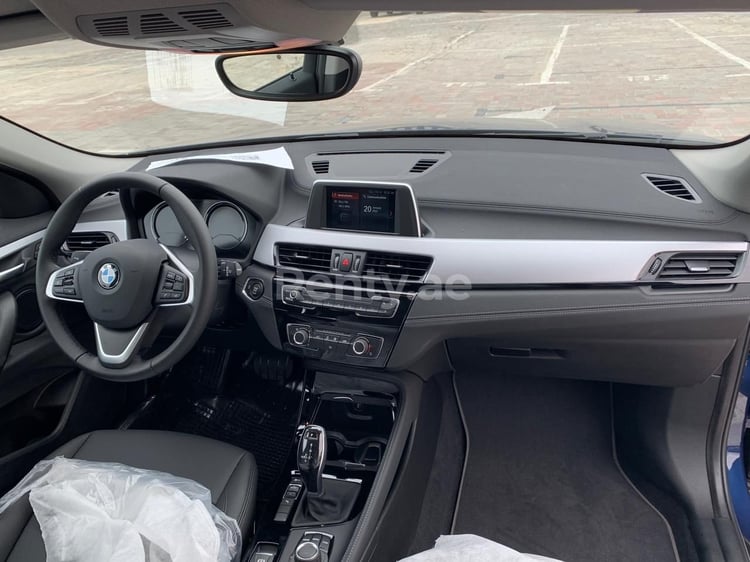 Blue BMW X2 for rent in Dubai 1