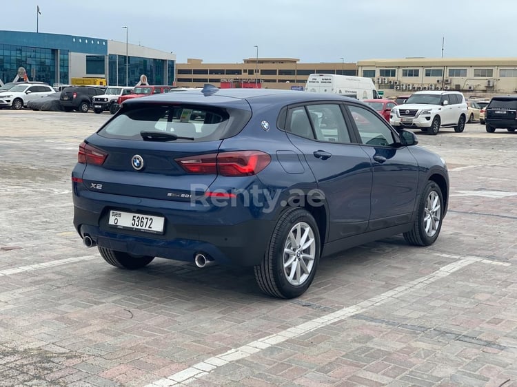 Blue BMW X2 for rent in Dubai 5