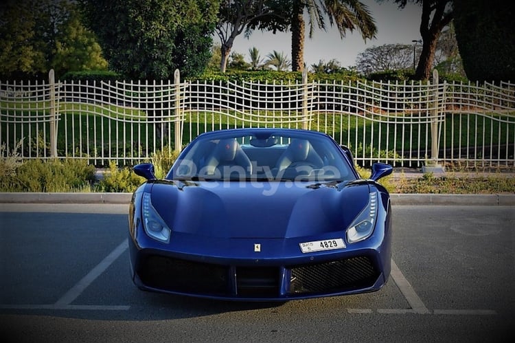 Blue Ferrari 488 Spyder for rent in Sharjah 0