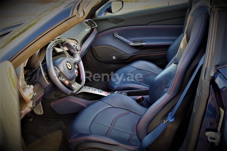 Blue Ferrari 488 Spyder for rent in Dubai 4