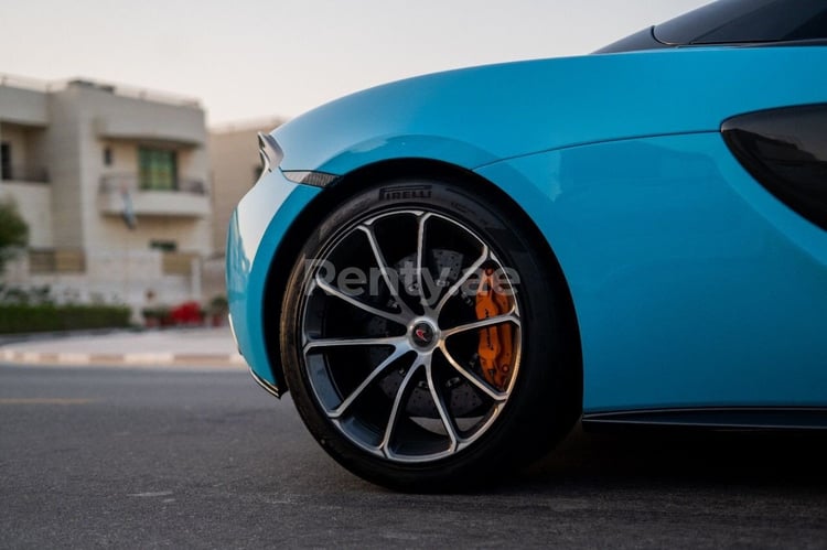 Blue McLaren 570S for rent in Dubai 4