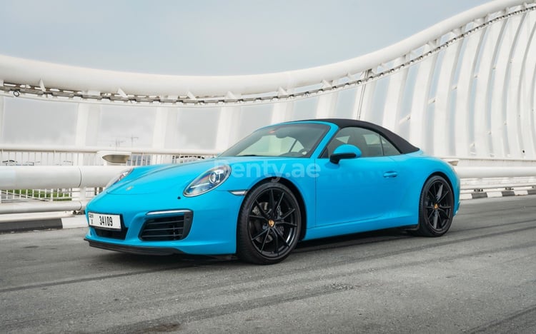 Blue Porsche 911 Carrera cabrio for rent in Sharjah