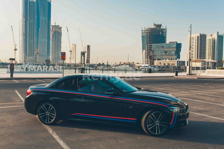 Black BMW 430i Cabrio for rent in Dubai 0