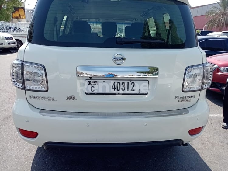 Bright White Nissan Patrol for rent in Dubai 2