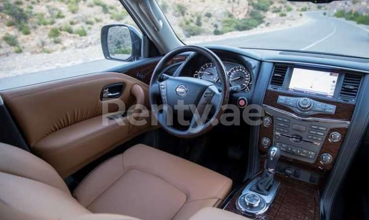 Bright White Nissan Patrol for rent in Sharjah 3