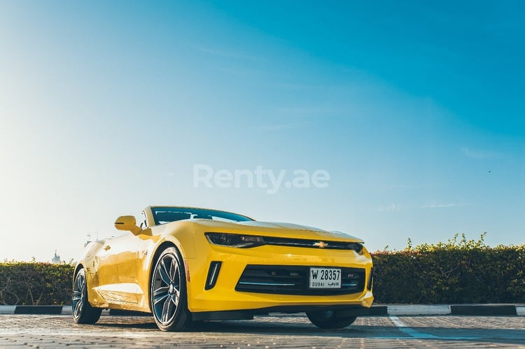 Yellow Chevrolet Camaro for rent in Dubai 1