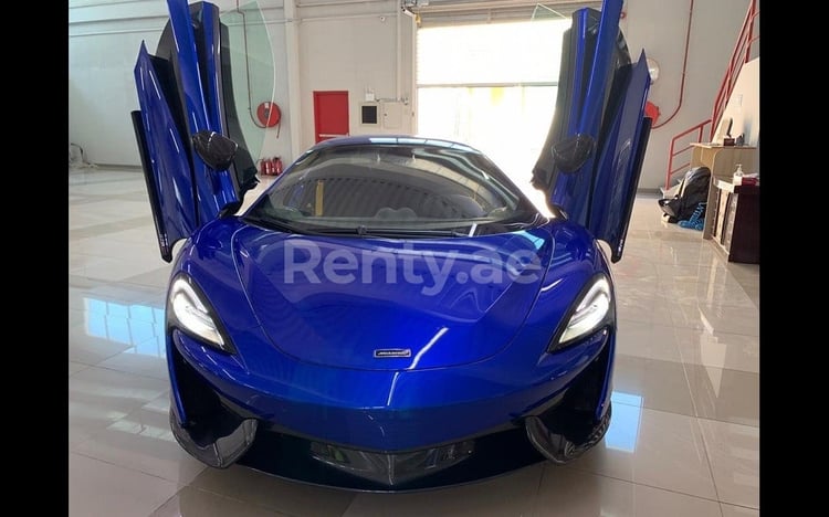 Dark Blue McLaren 570S for rent in Dubai